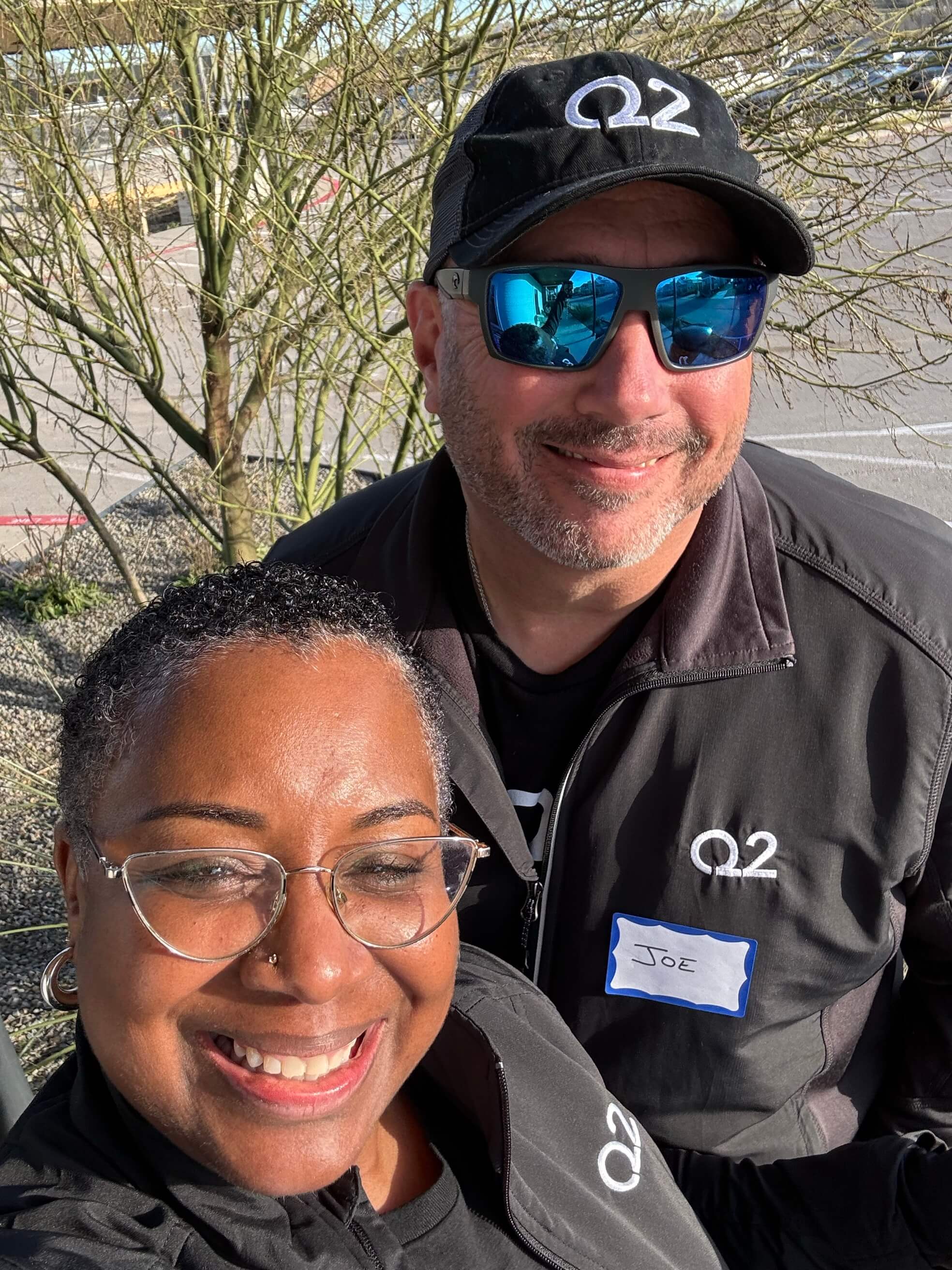 q2 employees smiling